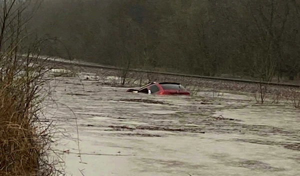 A view of a car submerged in water and flood from the tornado in Mississippi, US on March 24, 2023. (AP)