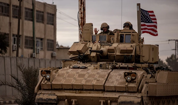 American soldiers patrol near prison that was attacked by the ISIS militants in Hassakeh, Syria, Tuesday, Feb. 8, 2022 (AP).