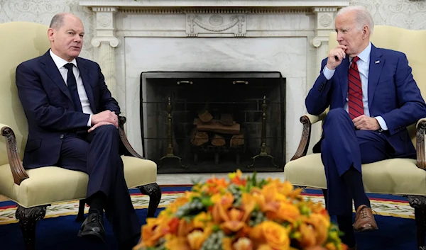 President Joe Biden listens as German Chancellor Olaf Scholz speaks during a meeting in the Oval Office of the White House in Washington, Friday, March 3, 2023 (AP).