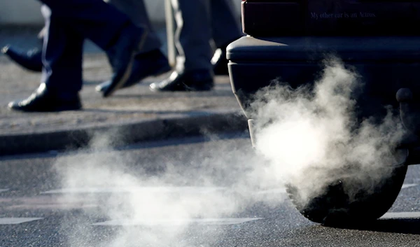 An exhaust pipe of a car is pictured on a street in a Berlin, Germany, February 22, 2018. (Reuters)