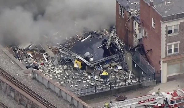 A photo from the explosion scene of the RM Palmer chocolate factory in Pennsylvania, US  on March 24, 2023 (AP)