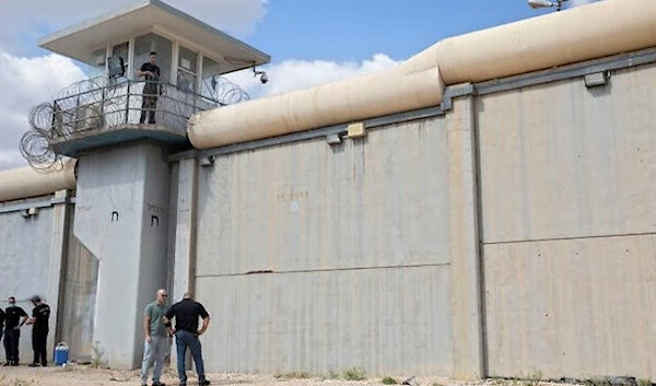 Israeli occupation forces standing outside the Gilboa Prison, on September 6, 2021. (AP)