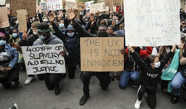 Demonstrators gather outside Downing Street during a Black Lives Matter march in London, on June 6, 2020.