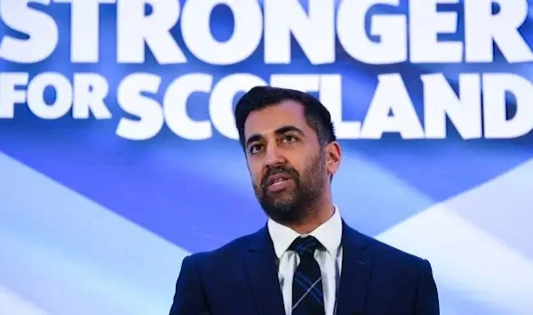 Newly appointed leader of the Scottish National Party (SNP), Humza Yousaf, speaks following the SNP Leadership election result announcement at Murrayfield Stadium in Edinburgh on March 27, 2023 (Andy Buchanan/ AFP)