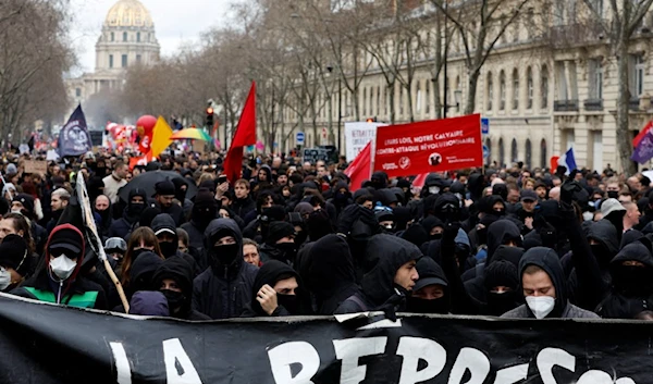 Protesters at a demonstration against the new pension reform in Paris on March 15, 2023 (Reuters)