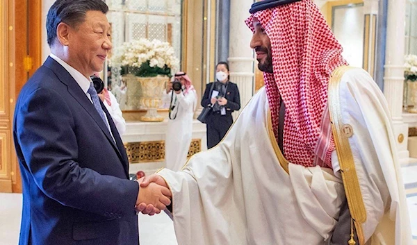 Saudi Crown Prince Mohammed bin Salman with Chinese President Xi Jinping during the China-Arab summit in Riyadh, the Saudi capital, December 2022 (AFP)