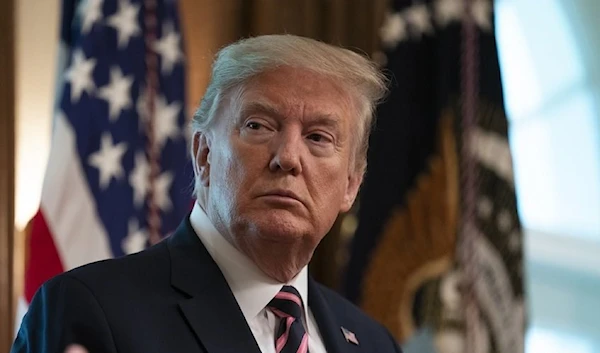 President Donald Trump listens during a demonstration of ways NASA is helping to combat the coronavirus, in the Cabinet Room of the White House, Friday, April 24, 2020, in Washington. (AP)