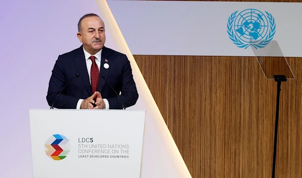 Foreign Minister Mevlut Cavusoglu speaks at the opening session of the 5th United Nations Conference on the Least Developed Countries (LDC5) in Doha, Qatar, March 5, 2023. (AFP)