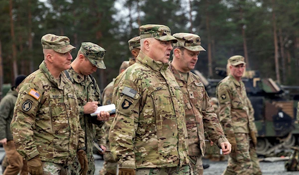 In this image provided by the US Army, US Chairman of the Joint Chiefs of Staff General Mark Milley meets with the US Army leaders responsible for the collective training of Ukrainians in Grafenwoehr, Germany, January 16, 2023 (AP Photo)