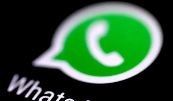 WhatsApp logo on a phone (Reuters)