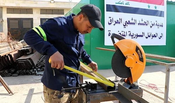 PMF engineers build housing units for Syrians (archive)