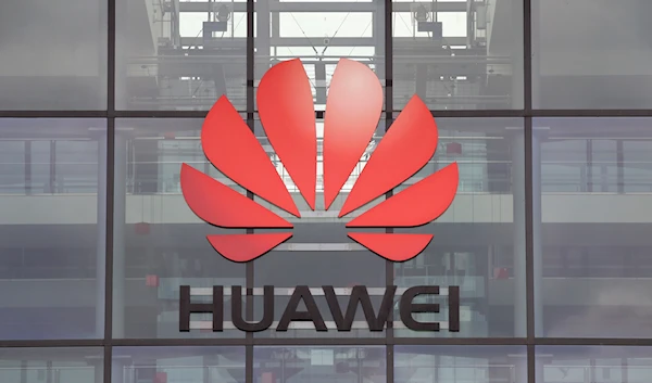 Huawei logo is pictured on the headquarters building in Reading, Britain July 14, 2020 (Reuters)