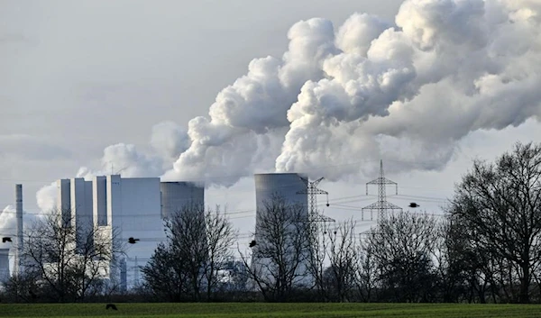 In this Monday, Jan. 13, 2020 file photo the RWE Niederaussem lignite-fired power station steams in Bergheim, Germany. (AP)