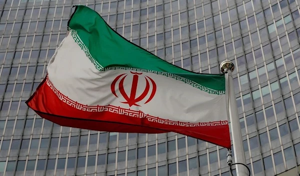 An Iranian flag flutters in front of the International Atomic Energy Agency (IAEA) headquarters in Vienna, Austria, September 9, 2019. (Reuters)