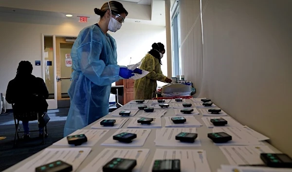 Certidied medical assistants conduct coronavirus rapid testing in the student health center at North Carolina Agricultural and Technical State University in Greensboro, N.C., Wednesday, Feb. 3, 2021. (AP)