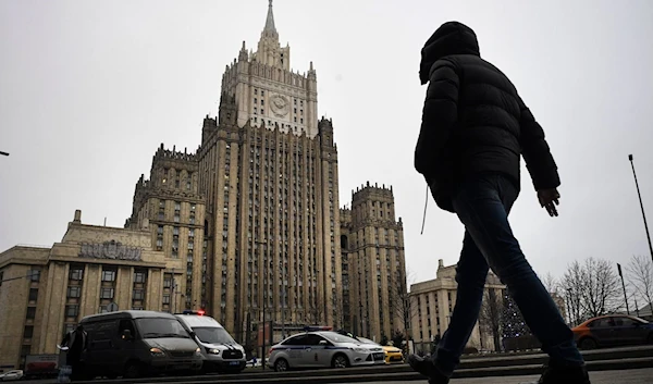 A man walks outside the Russian Foreign Ministry in Moscow, Russia. December 20, 2022. (AFP)