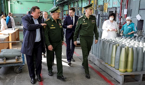 Russian Defense Minister Sergey Shoigu visiting defense factories in the Chelyabinsk and Kirov regions producing artillery rounds and rockets on 29 March, 2023 (AP).