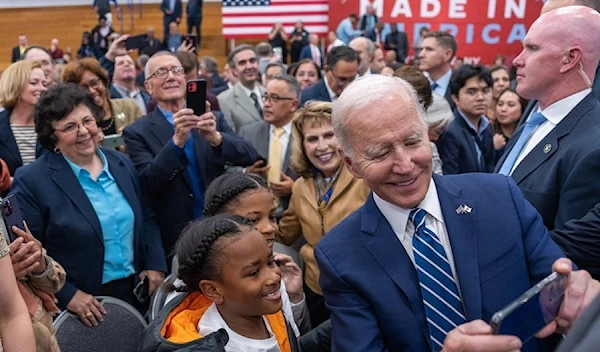 Picture taken from Joe Biden's Instagram page showing the US President taking a selfie with some of his supporters during a rally, 15 March 2023. (@joebiden/Instagram)