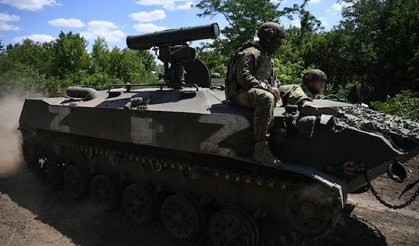 Russian soldiers of the Airborne Forces operate an infantry fighting vehicle customized with a Kornet anti-tank missile system. (Sputnik)