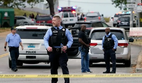 Police lock down the scene of a shooting at Central Visual and Performing Arts High School in St Louis, Missouri in 2022 (AP Photo)