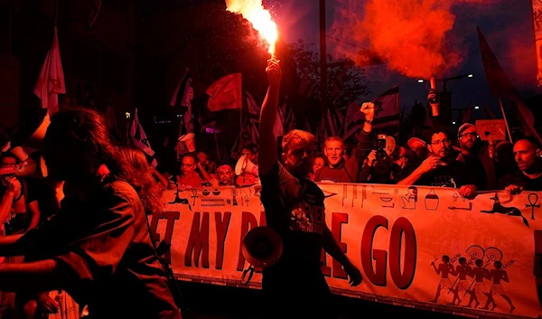 Israelis protest against plans by Prime Minister Benjamin Netanyahu's government to overhaul the judicial system, in "Tel Aviv", Saturday, April 8, 2023 (AP)