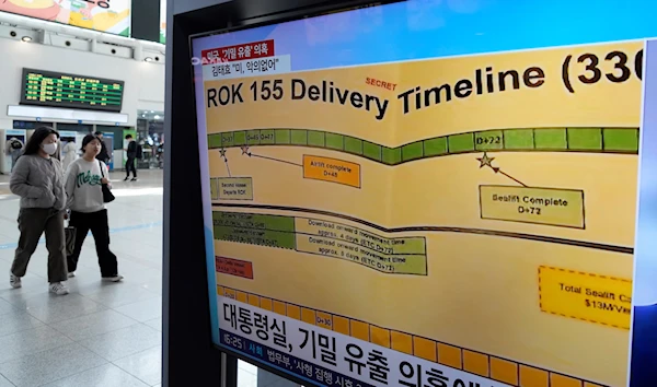 A TV screen shows a news program reporting on the leaked Pentagon documents at the Seoul Railway Station in Seoul, South Korea, Wednesday, April 12, 2023. (AP)