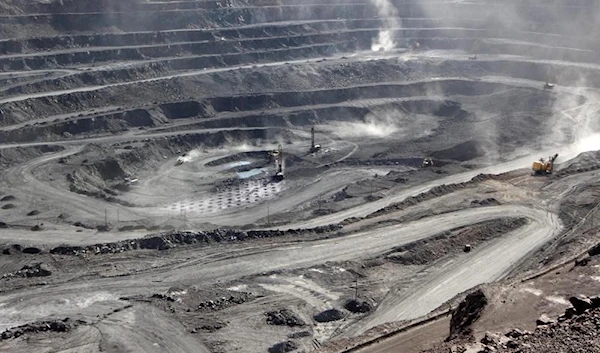 Miner work at the Bayan Obo mine that contains rare earth minerals, Inner Mongolia, China, 16 July 2011. (Reuters)