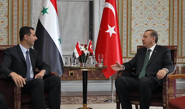 Turkey's Prime Minister Tayyip Erdogan (R) talks with Syria's President Bashar al-Assad during a meeting in Istanbul on June 7, 2010 (AFP)