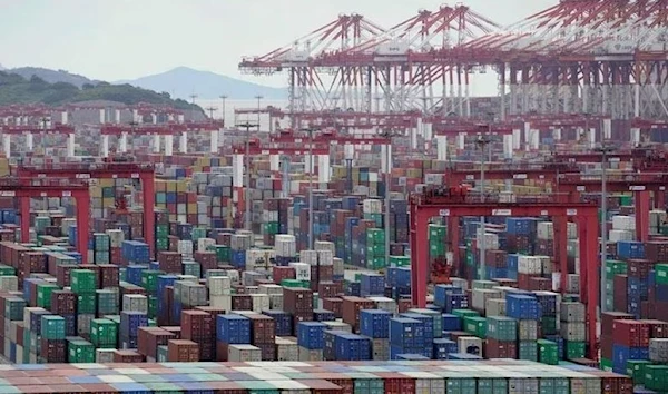 Containers are seen at the Yangshan Deep-Water Port in Shanghai, China October 19, 2020. (REUTERS