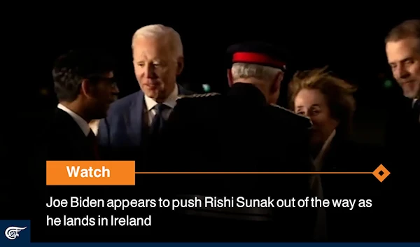 Joe Biden appears to push Rishi Sunak out of the way as he lands in Ireland