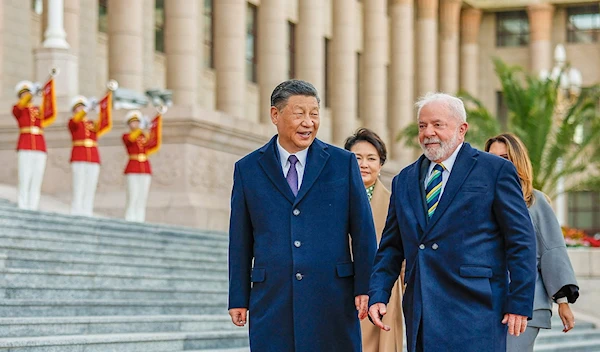 Brazil’s President Luiz Inacio Lula da Silva and China’s President Xi Jinping attend a welcoming ceremony at the Great Hall of the People in Beijing, China, April 14, 2023 (Reuters)