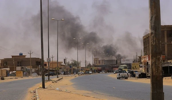 Smoke rising as clashes continue in Sudan between the RSF and the army on April 15, 2023 (Reuters)