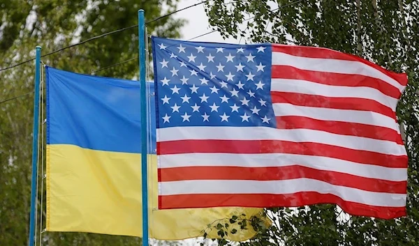 US and Ukrainian flags fly at a compound for police training outside Kiev, Ukraine, 6 May 2016. (Reuters)