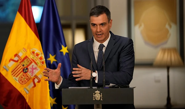 Spanish Prime Minister Pedro Sanchez speaks during a press conference held at the Spanish embassy in Beijing, March 31, 2023 (AP)