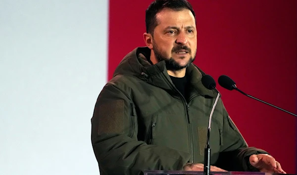 Ukrainian President Volodymyr Zelenskyy holds a speech during his visit to Warsaw, Poland, April 5, 2023 (AP)