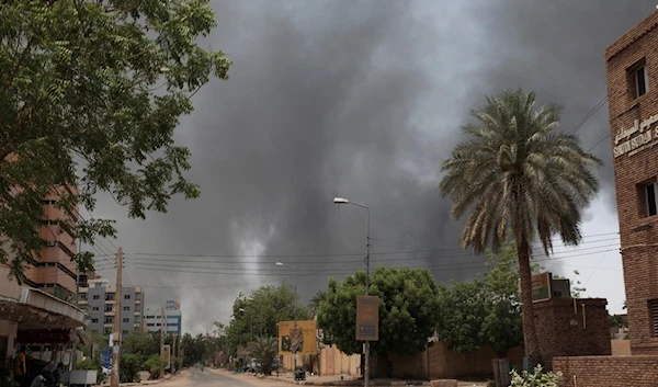 Smoke is seen rising in Khartoum, Sudan, Saturday, April 15, 2023 (AP Photo/Marwan Ali)