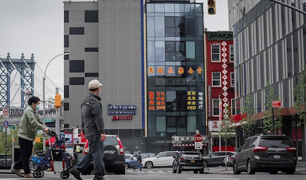 A six story glass facade building, center, is believed to be the site of a foreign police outpost for China in New York's Chinatown, Monday, April 17, 2023. (AP)