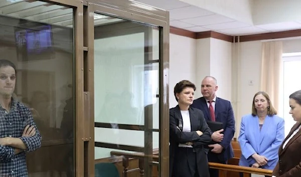 WSJ journalist Evan Gershkovich stands in a Moscow courtroom on April 18, 2023, during an unsuccessful appeal against his detention on espionage charges. (Reuters)