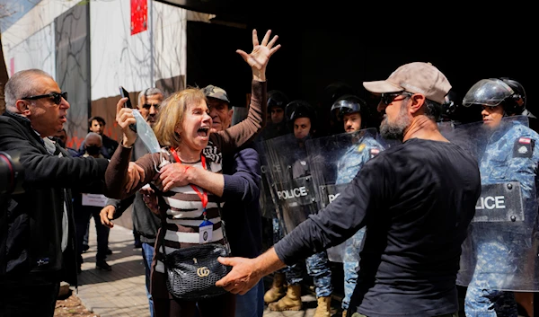 Frustrated depositors react during a rally against Central Bank Gov. Riad Salameh in Beirut, Lebanon, March 24, 2023 (AP)