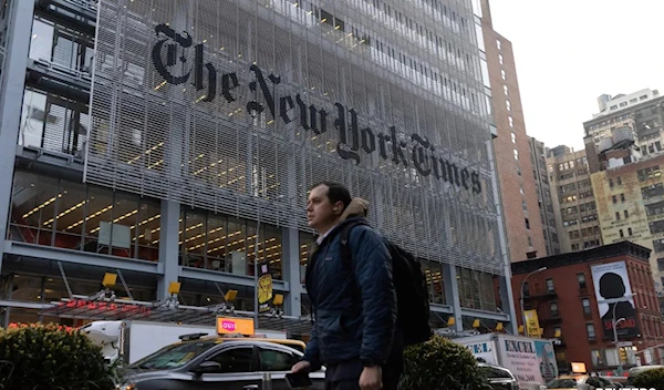 A man walking in front of the New York Times headquarters in New York, US (Reuters)