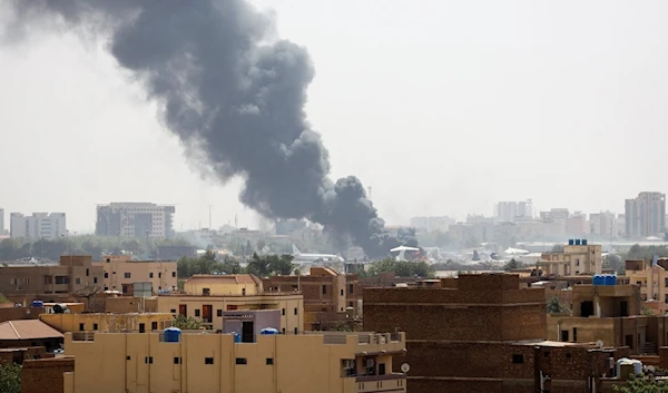 Smoke rises from burning aircraft inside Khartoum Airport during clashes between the paramilitary RSF and the army in Khartoum, Sudan, April 17, 2023 (Reuters)