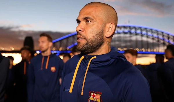 FC Barcelona player Dani Alves visits the Sydney Opera House with fellow members of the squad during their trip to Australia for a friendly soccer match against the A-League All-Stars, in Sydney, Australia, May 24, 2022 (Reuters)