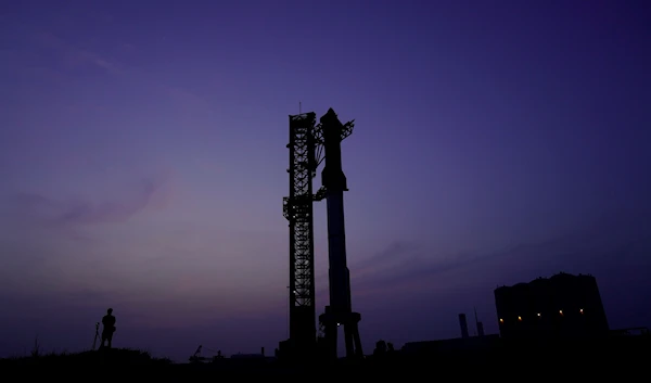 Visitors look on as SpaceX's Starship, the world's biggest and most powerful rocket, as it stands ready for a scheduled launch from Starbase in Boca Chica, Texas, Wednesday, April 19, 2023. (AP)