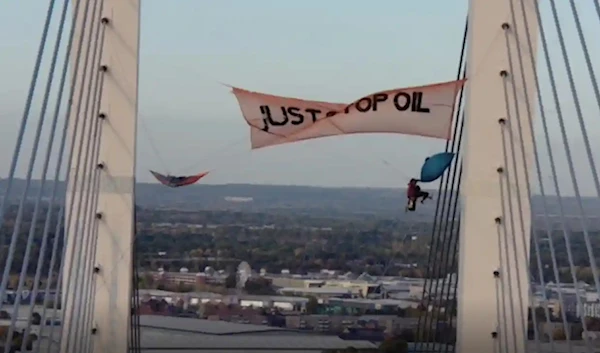 2 UK climate protestors jailed for climbing bridge, delaying traffic