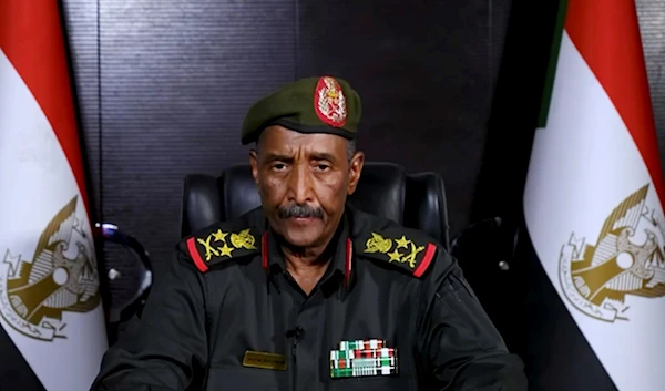 In this image taken from video released on Friday, April 21, 2023, by the Sudanese Armed Forces, General Abdel-Fattah Burhan, Commander of the Armed Forces, delivers a message at an undisclosed location (Sudanese Armed Forces via AP)