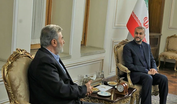 Palestinian Islamic Jihad Secretary-General Ziyad Al-Nakhalah and Iranian Foreign Minister Hossein Amir-Abdollahian