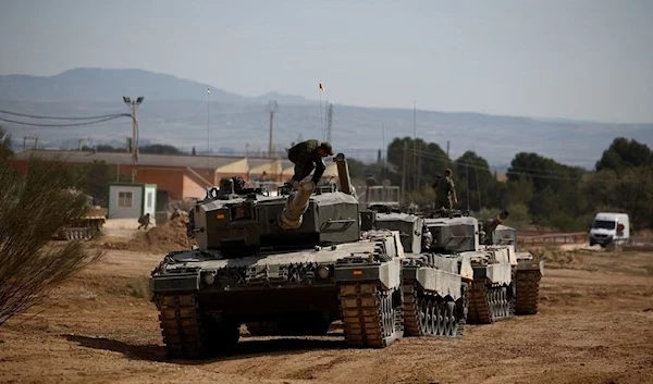 Troops of the Spanish Armed Forces train Ukrainian military personnel on the operation and maintenance of Leopard tanks, at San Gregorio Training Center, Zaragoza, Spain ,13 March 2023. (Reuters)