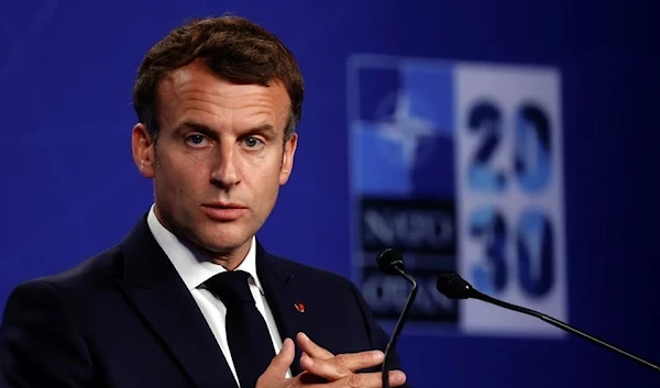 French President Emmanuel Macron holds a conference during NATO's summit in Brussels, Belgium, 14 June 2021. (Reuters)