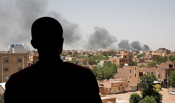 Smoke is seen in Khartoum, Sudan, Saturday, April 22, 2023 (AP Photo/Marwan Ali)