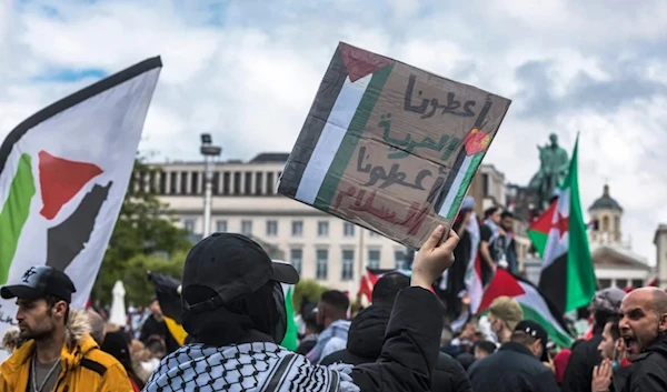 People demonstrate in solidarity with the Palestinians in Brussels. (AFP)